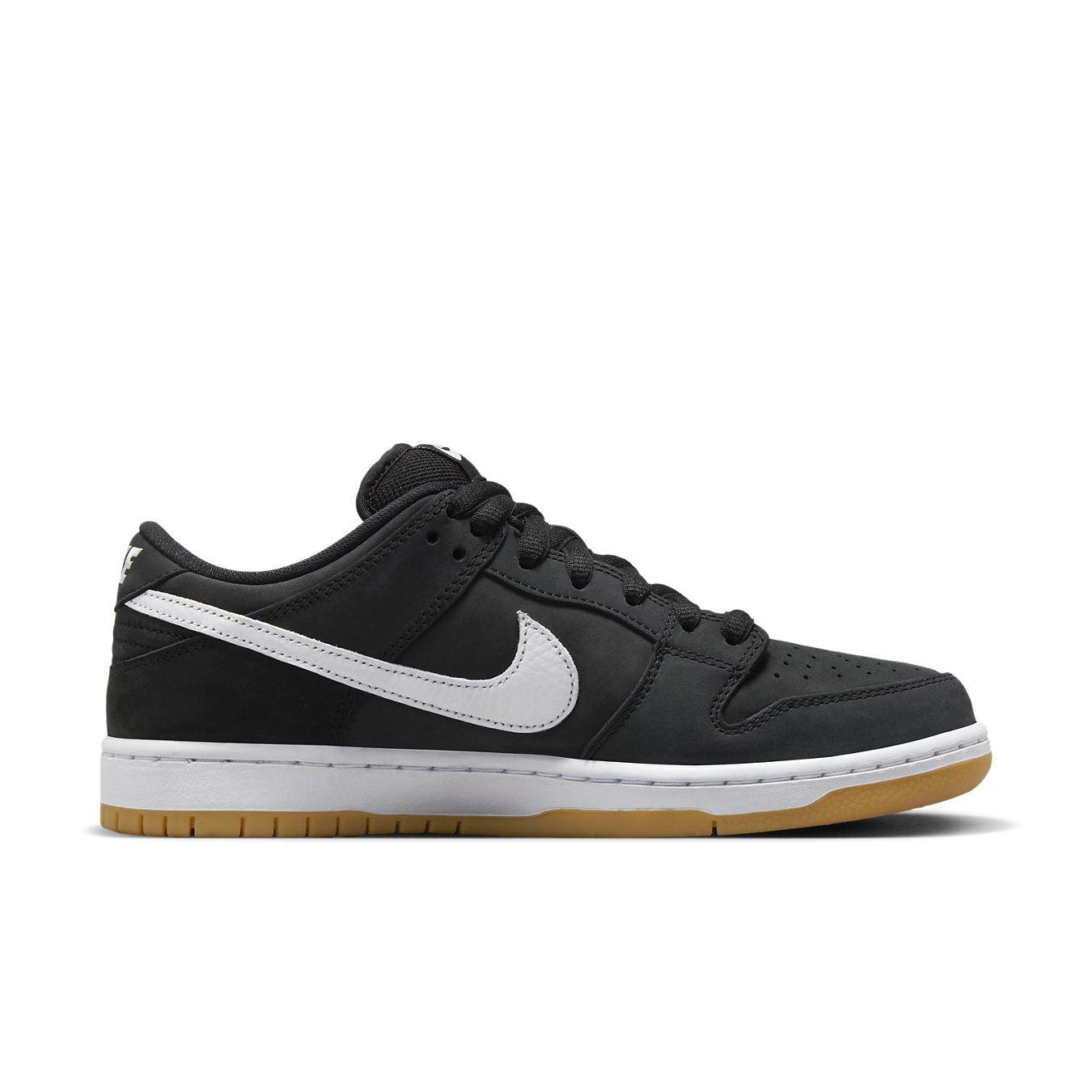 Nike SB Dunk Low Black Gum sneaker featuring a black nubuck upper and white leather Swoosh with a gum rubber outsole.
