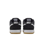 Nike SB Dunk Low Black Gum sneakers from the back showcasing black nubuck and white leather detailing.