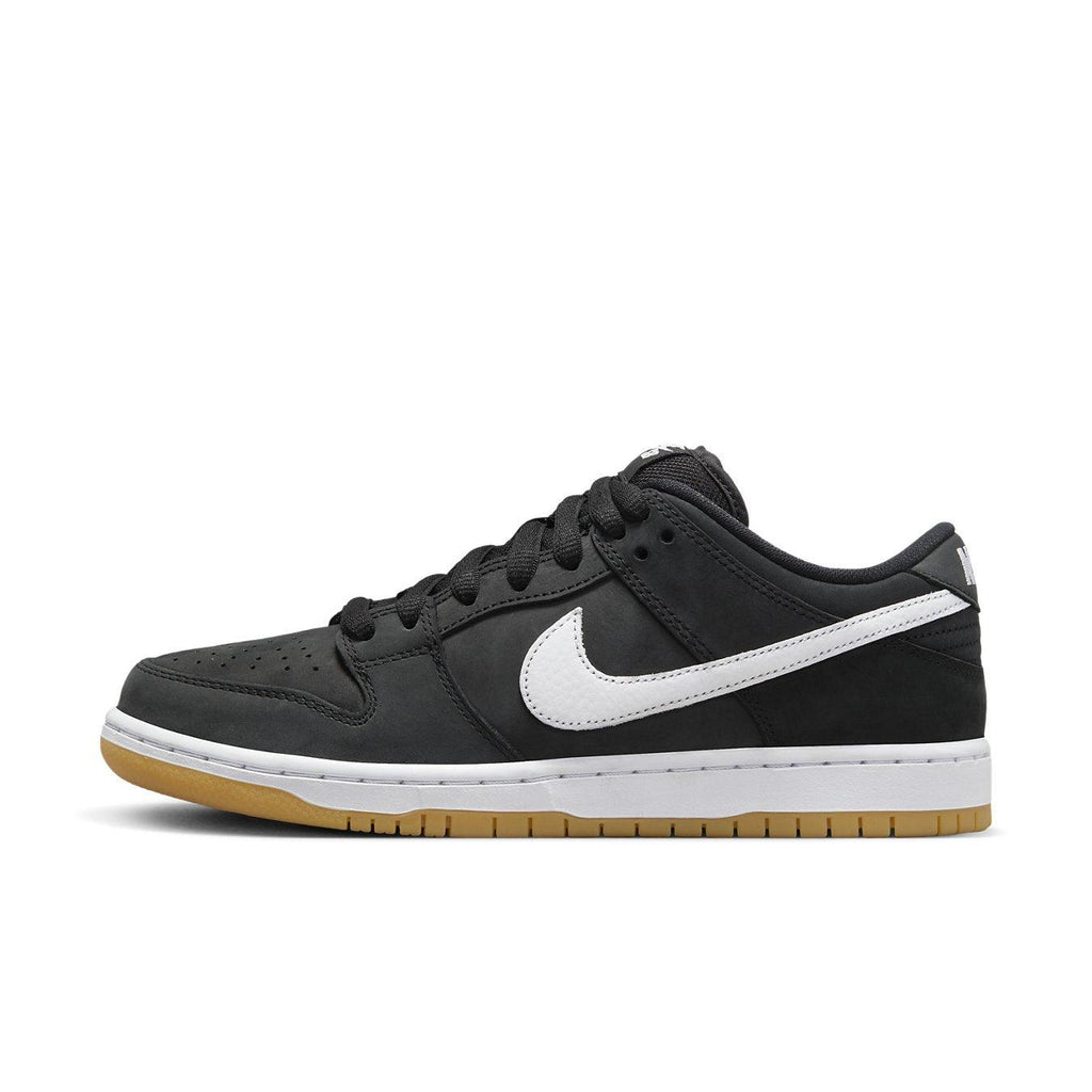 Nike SB Dunk Low Black Gum features a black nubuck upper, white Swoosh, and gum rubber outsole, ideal for casual wear.