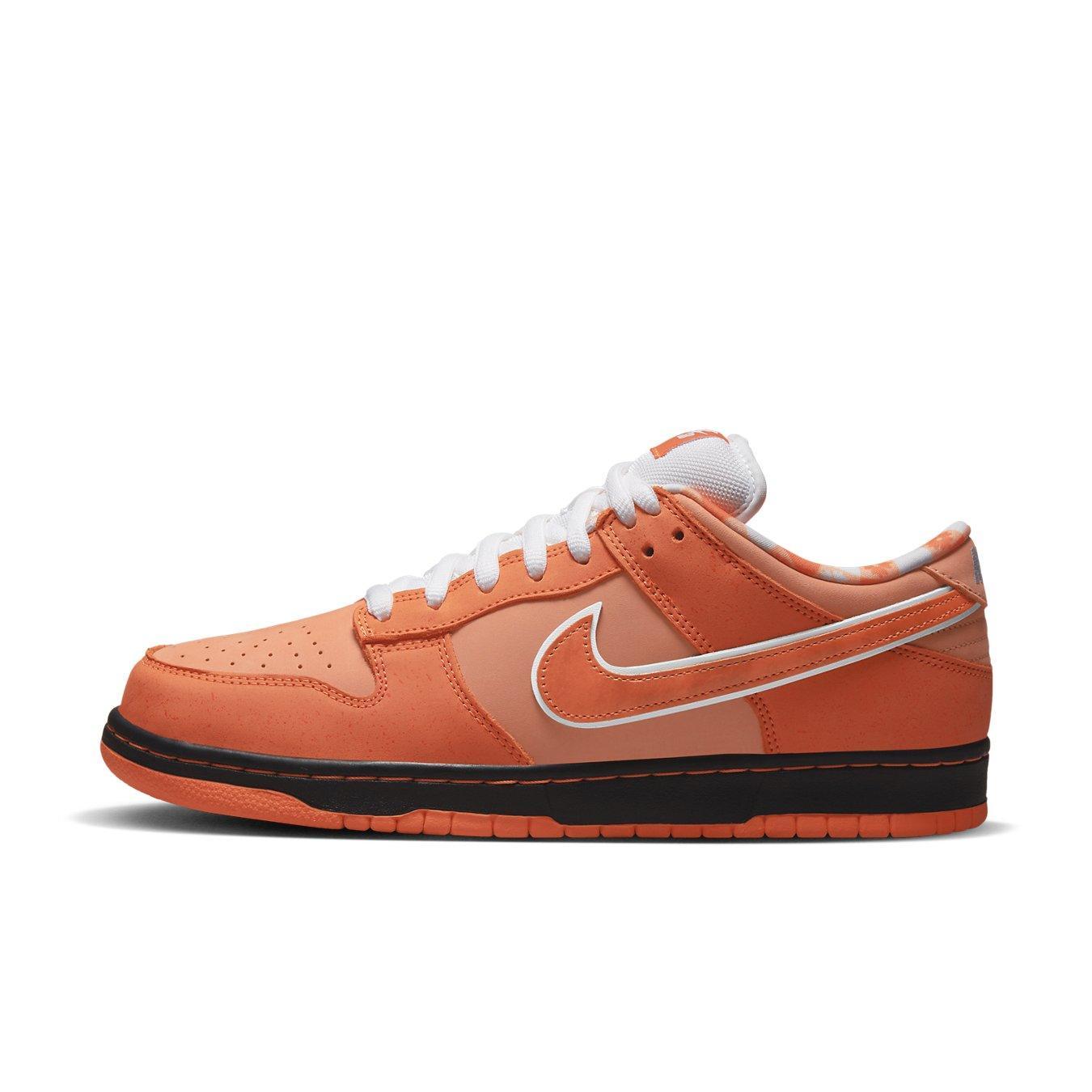 Nike SB Dunk Low Concepts Orange Lobster sneaker in orange nubuck with white Swoosh and black sole.