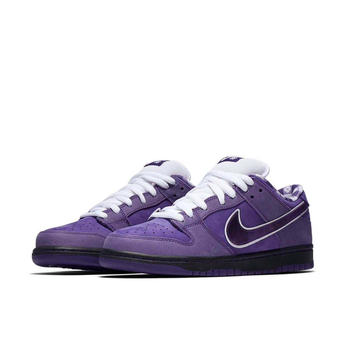 Nike SB Dunk Low Concepts Purple Lobster sneakers in vibrant purple with white laces and black sole.