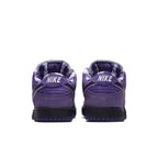 Nike SB Dunk Low Purple Lobster shoes, featuring a vibrant purple colorway and unique detailing on the back.