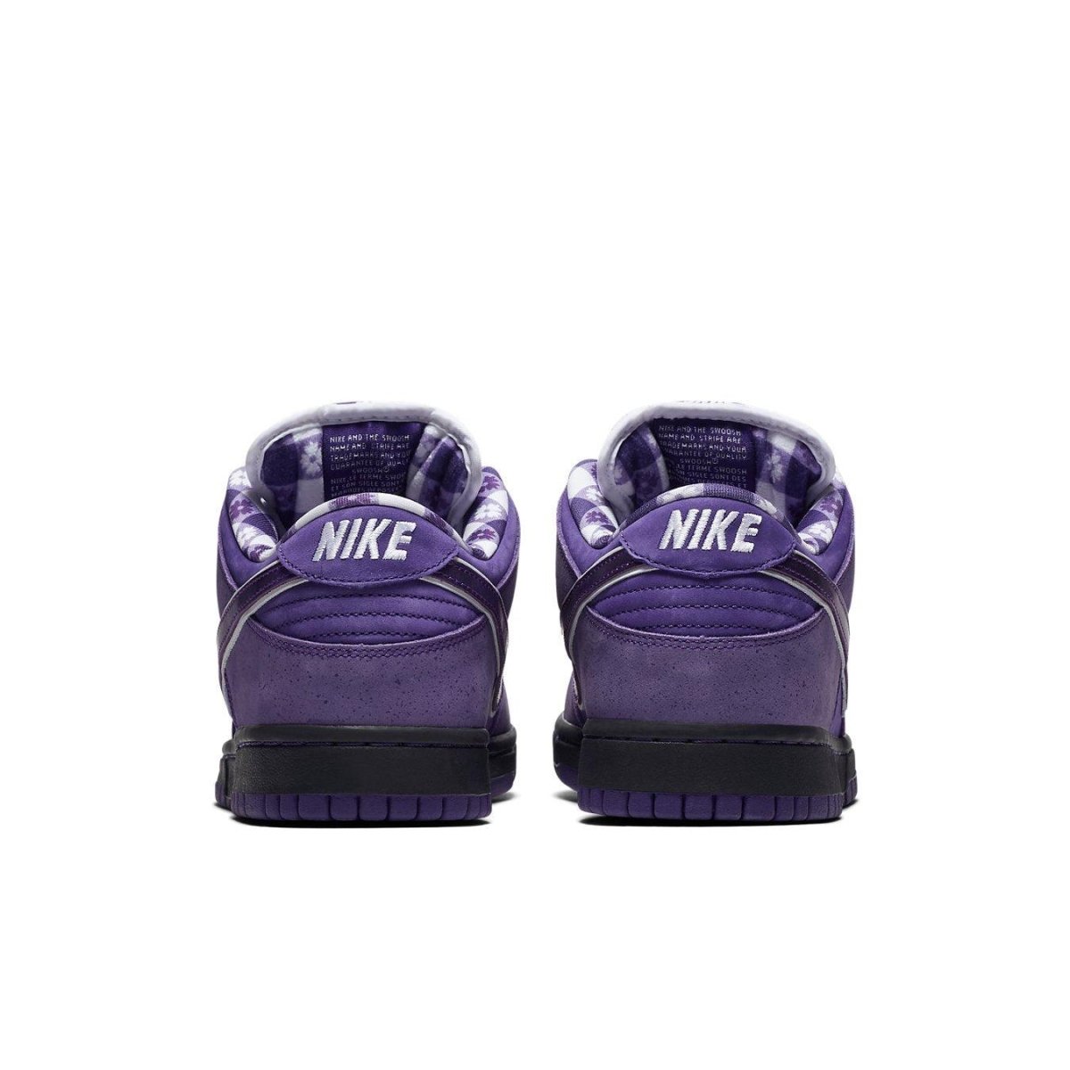 Nike SB Dunk Low Purple Lobster shoes, featuring a vibrant purple colorway and unique detailing on the back.