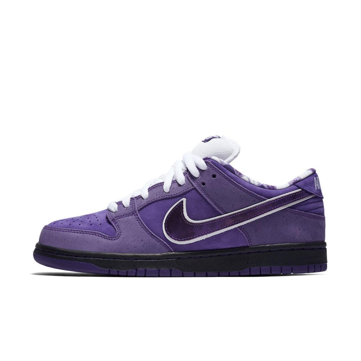 Nike SB Dunk Low 'Purple Lobster' sneaker featuring a vibrant purple upper and sleek black sole.