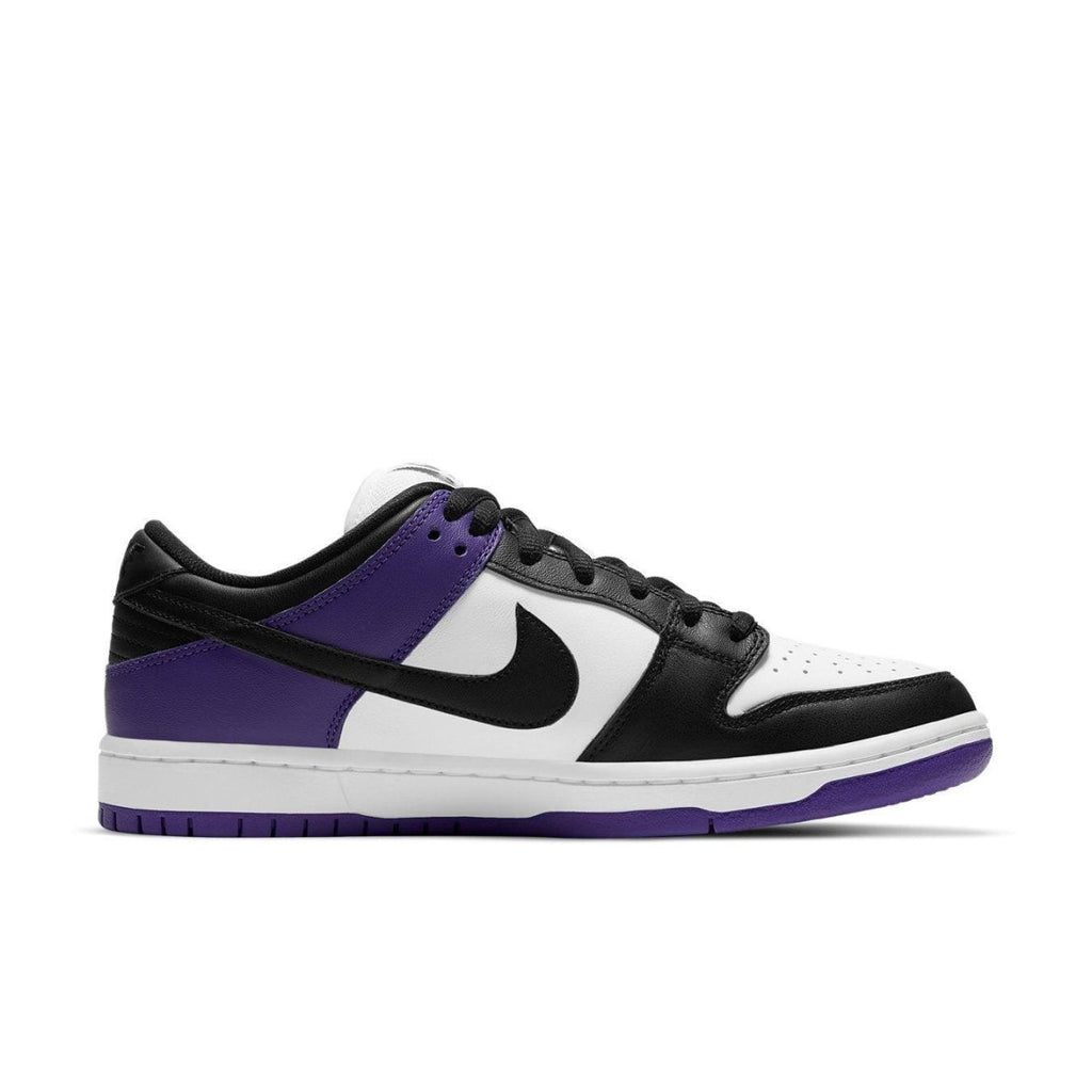Nike SB Dunk Low Court Purple sneaker in black, white, and court purple colorway, featuring a stylish low-top design.