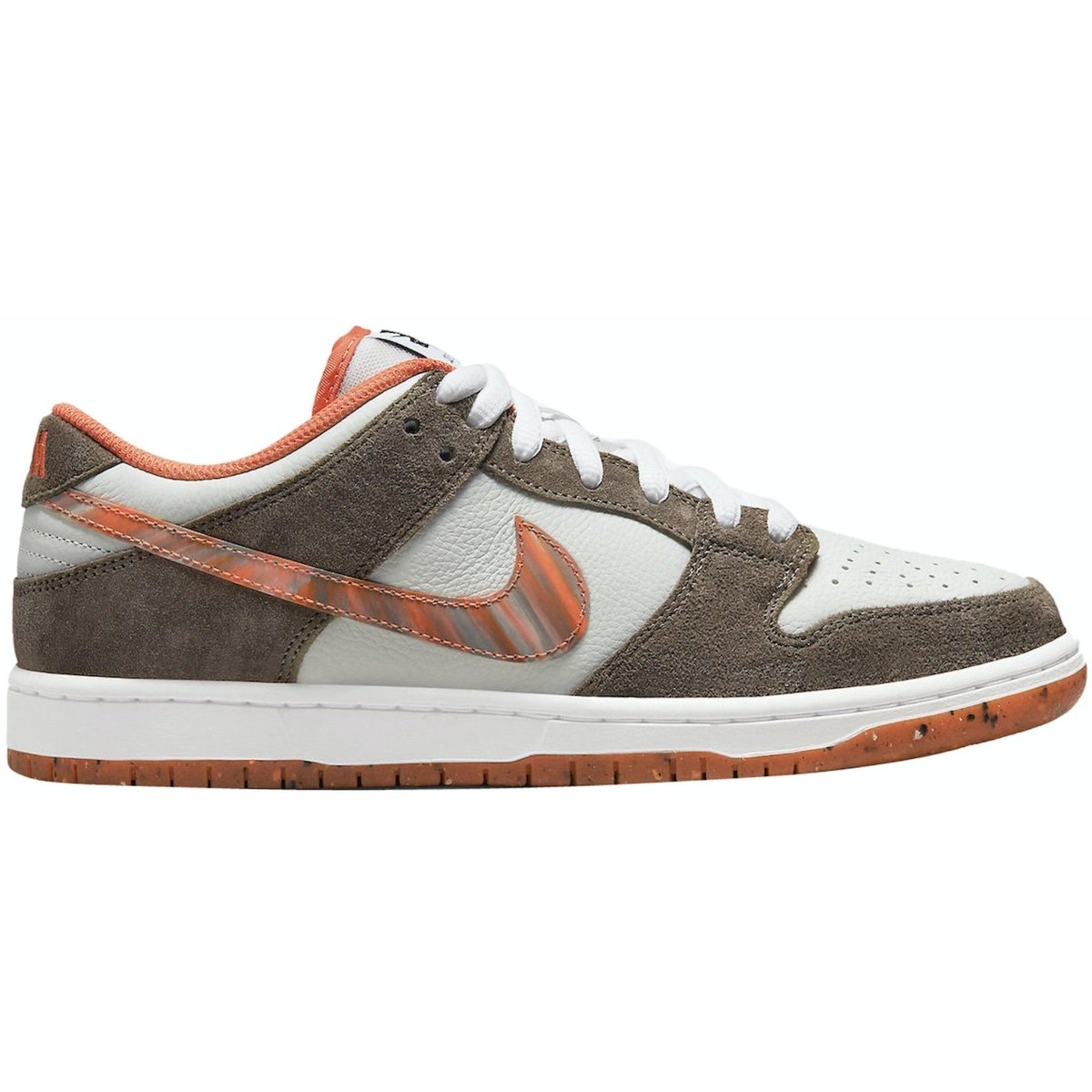 Nike SB Dunk Low Crushed D.C. sneaker in gray and orange colorway with suede and leather details.