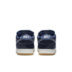 Nike SB Dunk Low Denim Sashiko sneakers, rear view showcasing premium denim and Swoosh detail.
