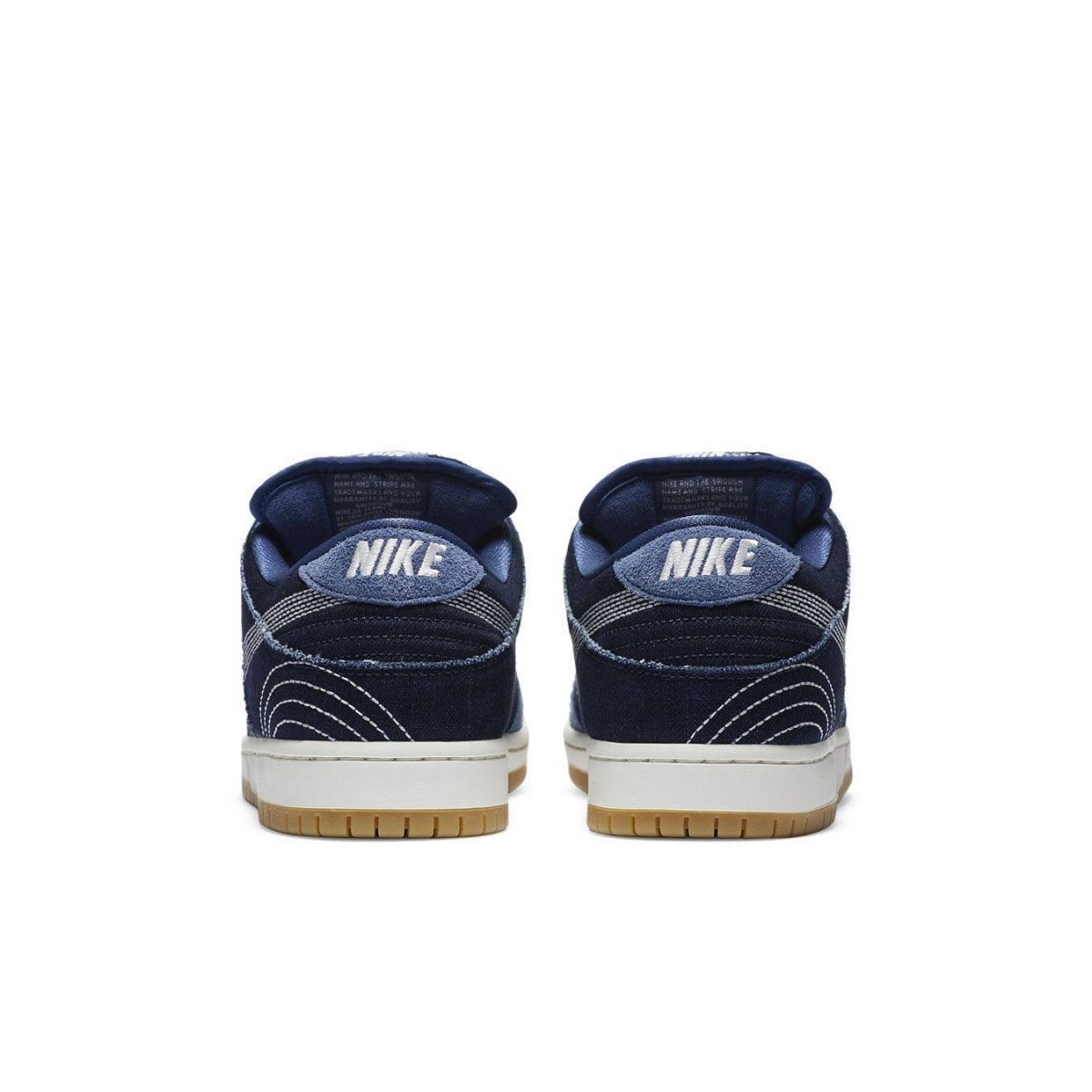 Nike SB Dunk Low Denim Sashiko sneakers, rear view showcasing premium denim and Swoosh detail.