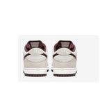 Nike SB Dunk Low Desert Sand Mahogany shoes, featuring a low-cut design and comfortable collar for skating.
