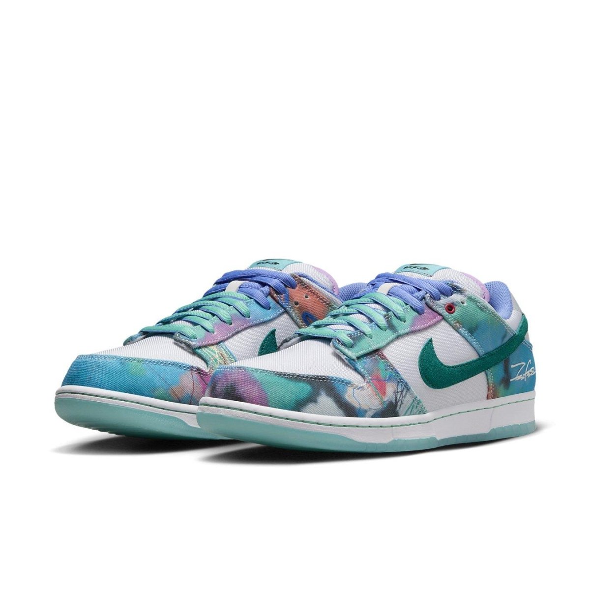 Nike SB Dunk Low Futura Laboratories Bleached Aqua with abstract multicolor prints and teal Swoosh.