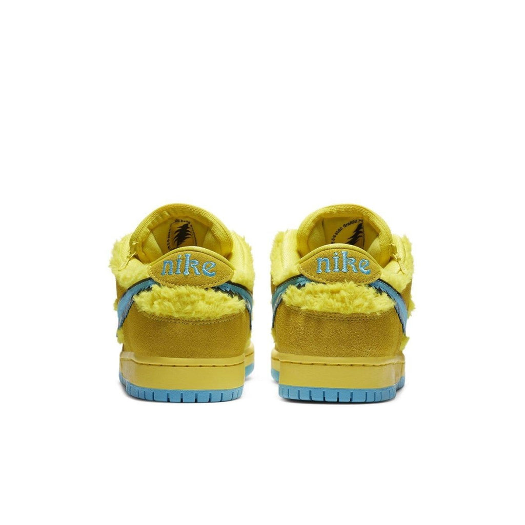 Nike SB Dunk Low Grateful Dead Bears Opti Yellow sneakers featuring vibrant yellow fur and blue accents on the heel.