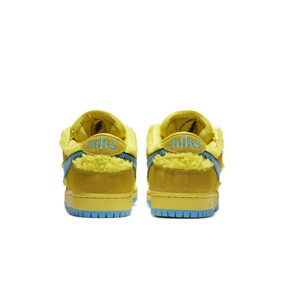 Nike SB Dunk Low Grateful Dead Bears Opti Yellow sneakers featuring vibrant yellow fur and blue accents on the heel.