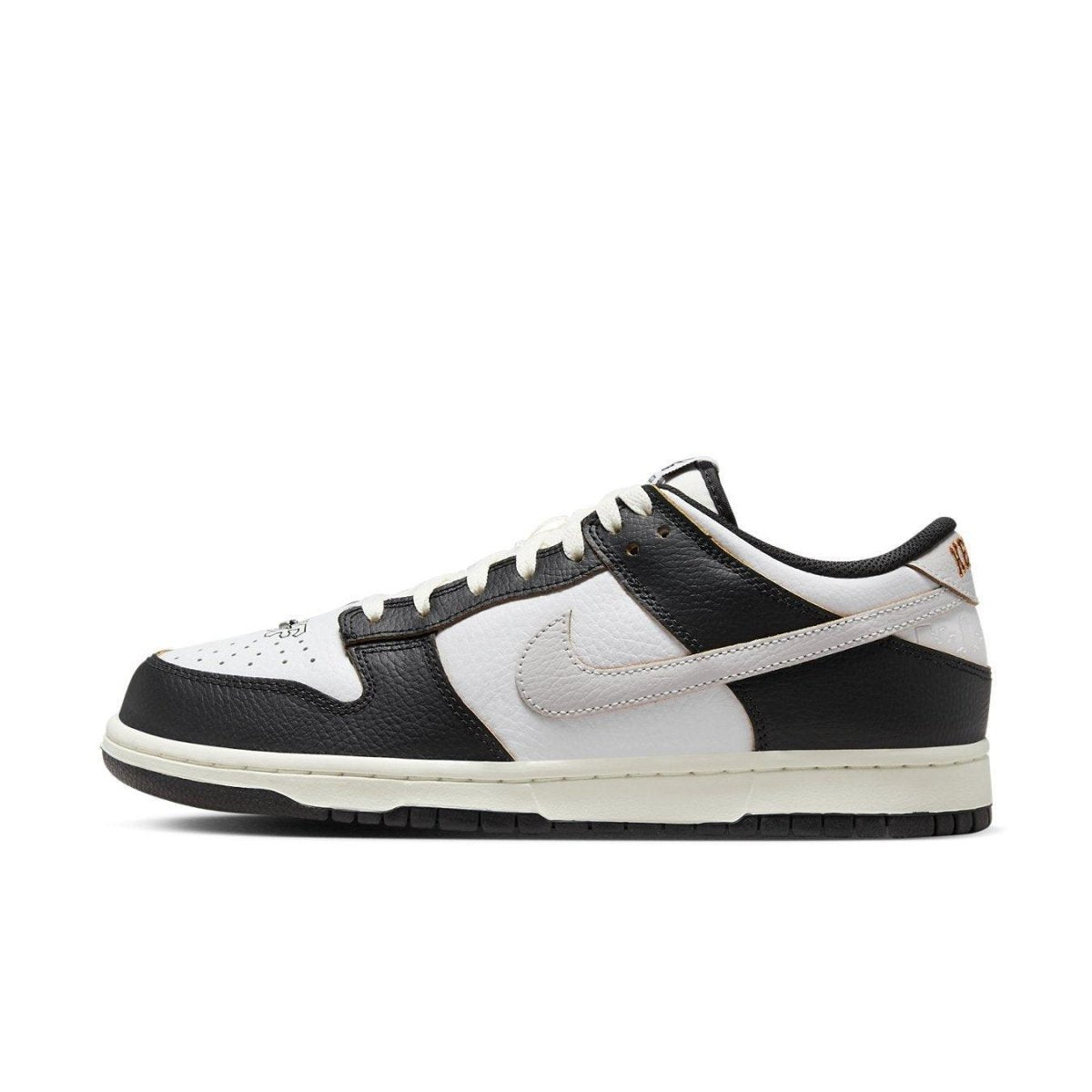 Nike SB Dunk Low HUF San Francisco sneaker showcasing a black and white colorway, inspired by SF Giants.