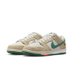 Nike SB Dunk Low Jarritos featuring white leather, hemp overlays, and a green Swoosh.