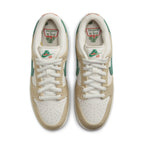 Nike SB Dunk Low Jarritos showcasing white leather and green malachite Swoosh with Jarritos logo on the tongue.
