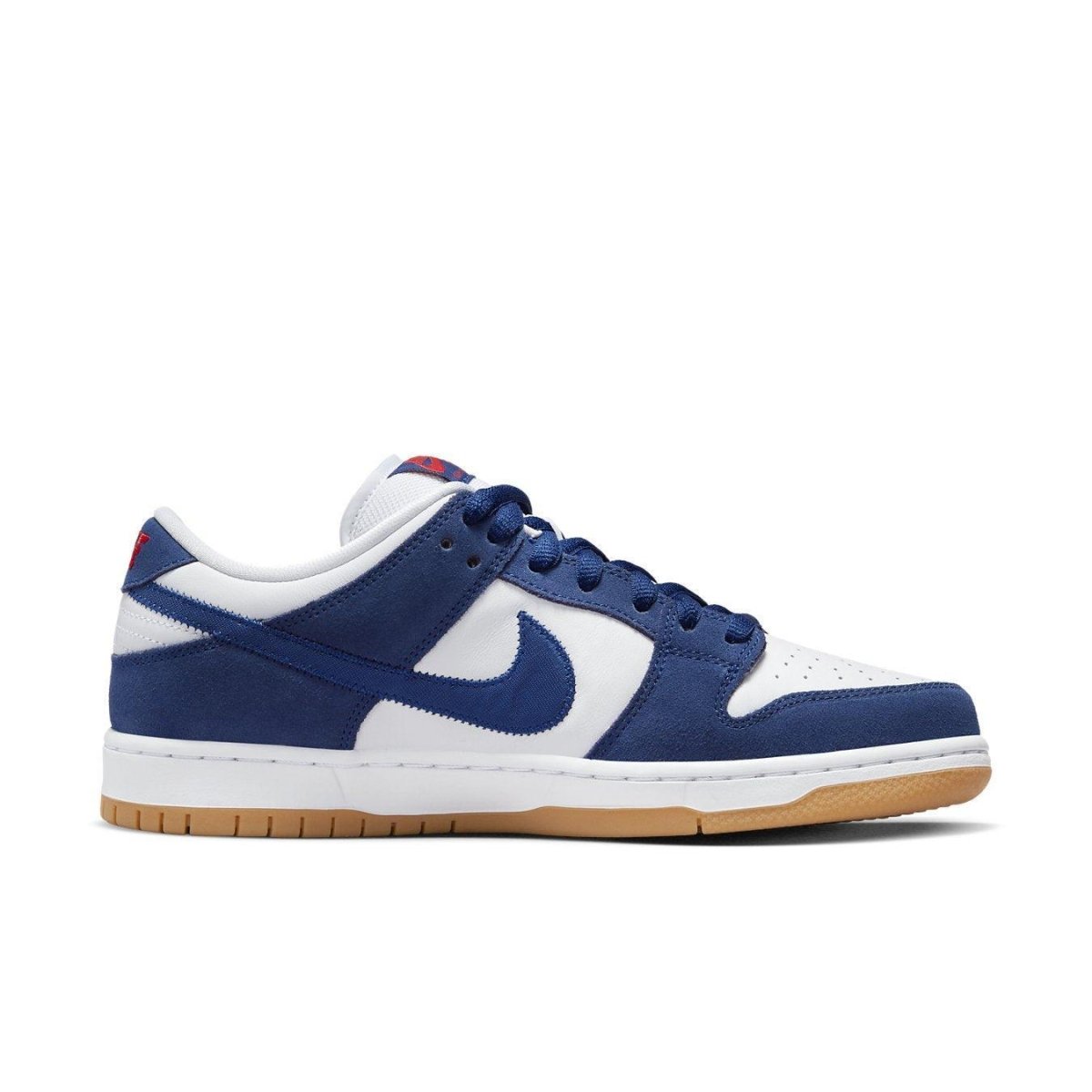 Nike SB Dunk Low Los Angeles Dodgers in Deep Royal Blue, White, and Gum Light Brown with red branding.