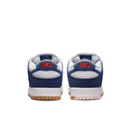 Nike SB Dunk Low Los Angeles Dodgers sneakers, featuring blue suede and white leather with red branding on the heel.