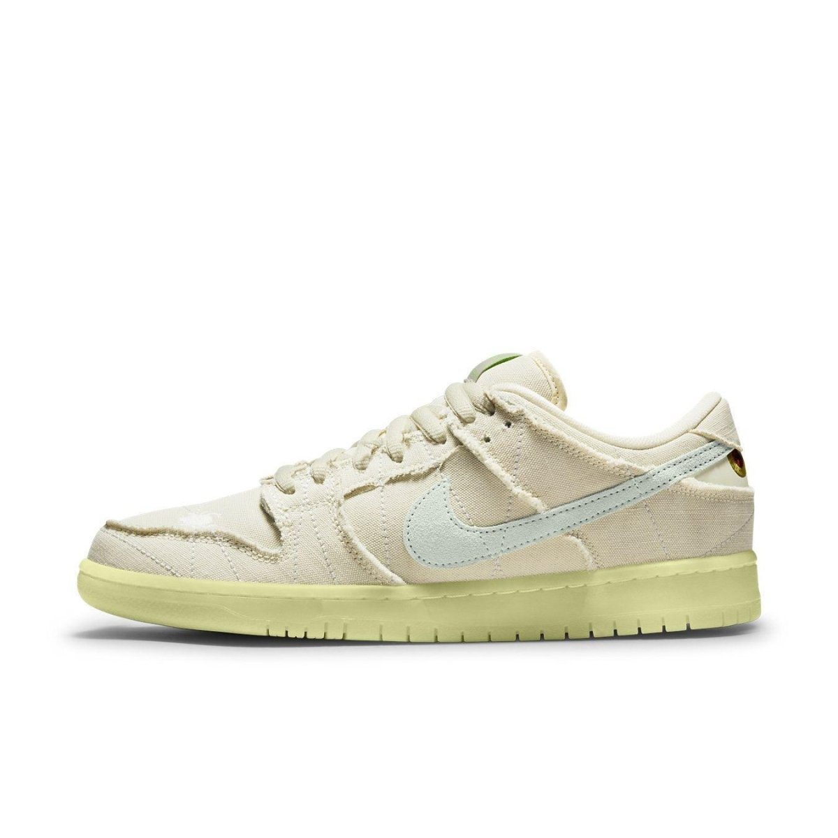 Nike SB Dunk Low 'Mummy' sneaker with white canvas upper and glow-in-the-dark sole for Halloween.