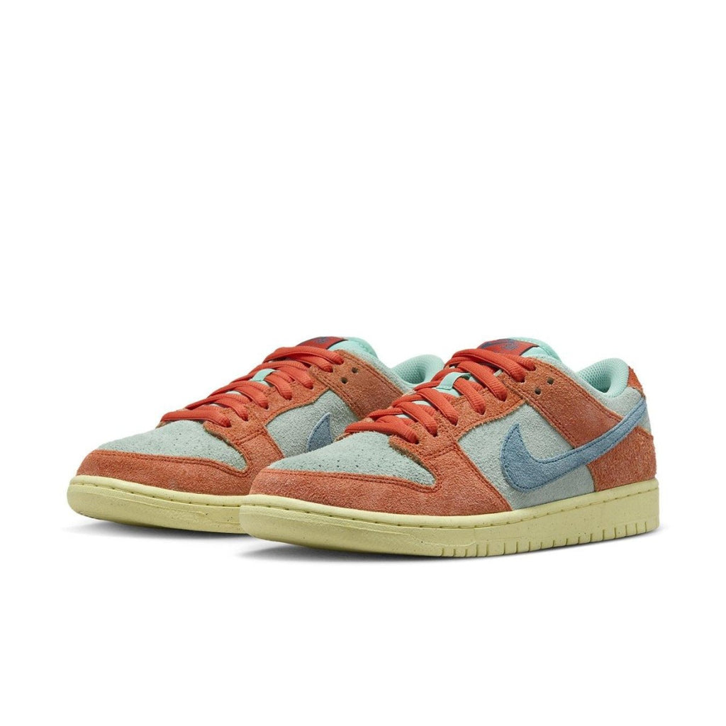 Nike SB Dunk Low Orange Emerald Rise featuring suede in emerald and vibrant orange accents.