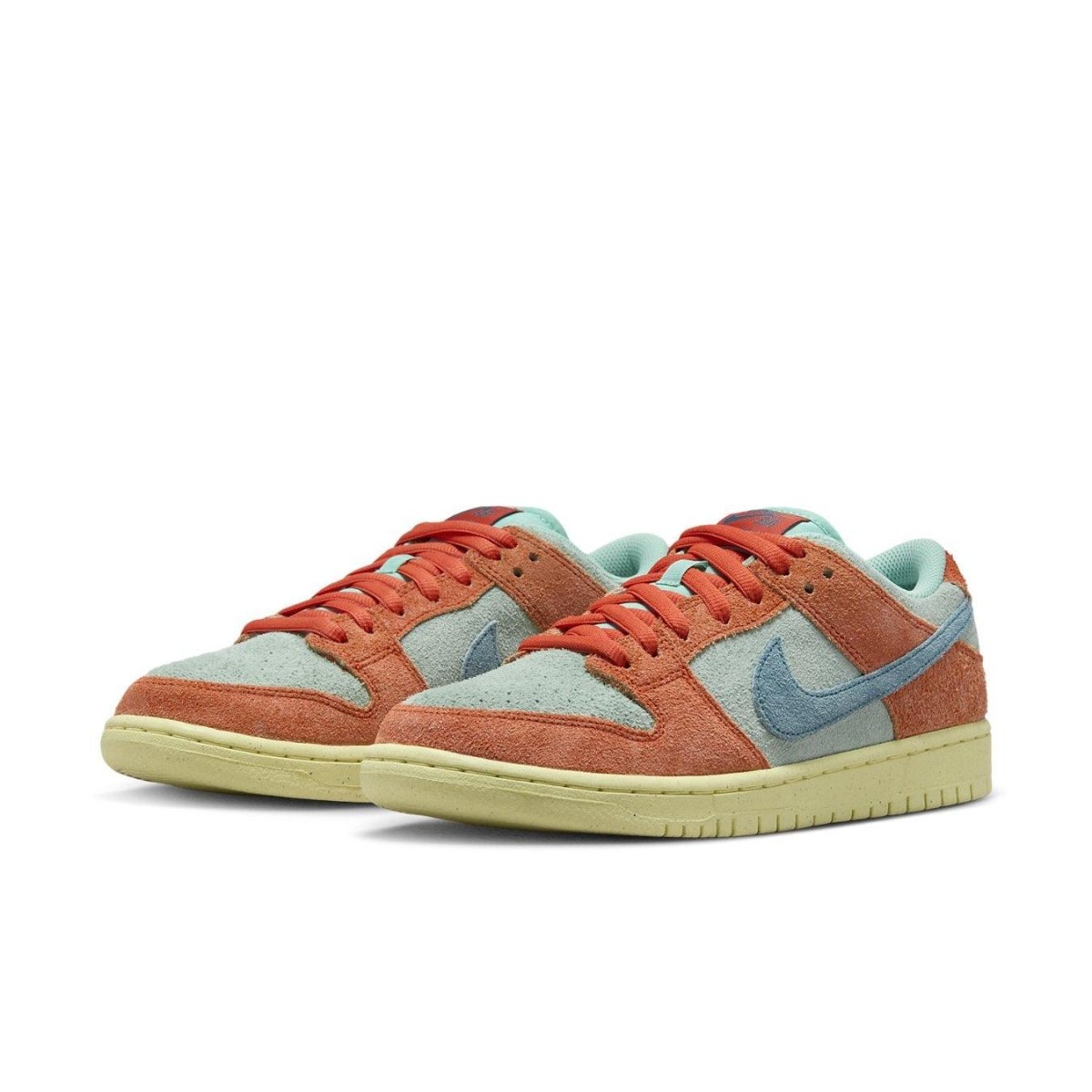 Nike SB Dunk Low Orange Emerald Rise featuring suede in emerald and vibrant orange accents.