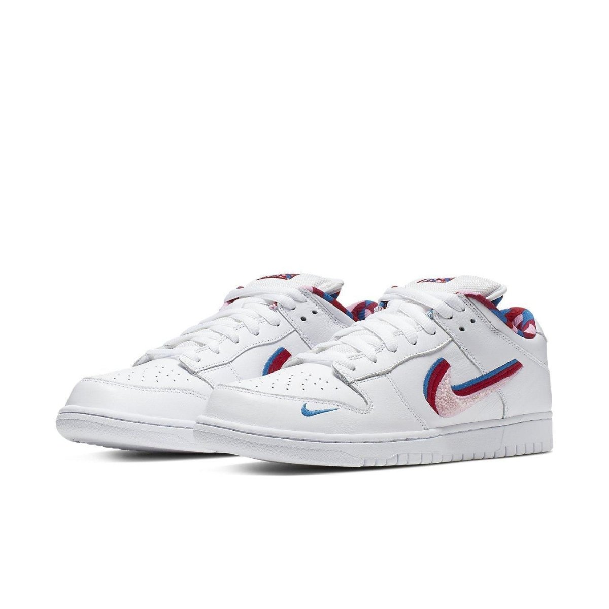 Nike SB Dunk Low Parra in white, pink, red, and blue with vivid Swoosh details and unique artist touches.