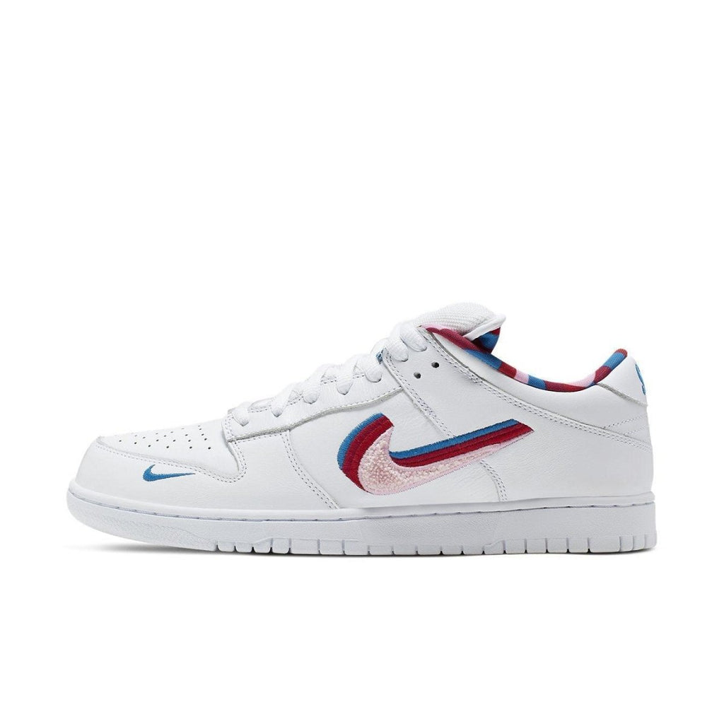 Nike SB Dunk Low Parra featuring white, pink, red, and blue color scheme with signature Swooshes and cozy velvet details.