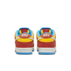 Nike SB Dunk Low Pro Bart Simpson shoes featuring red, yellow, and blue colorway with Swoosh logo.