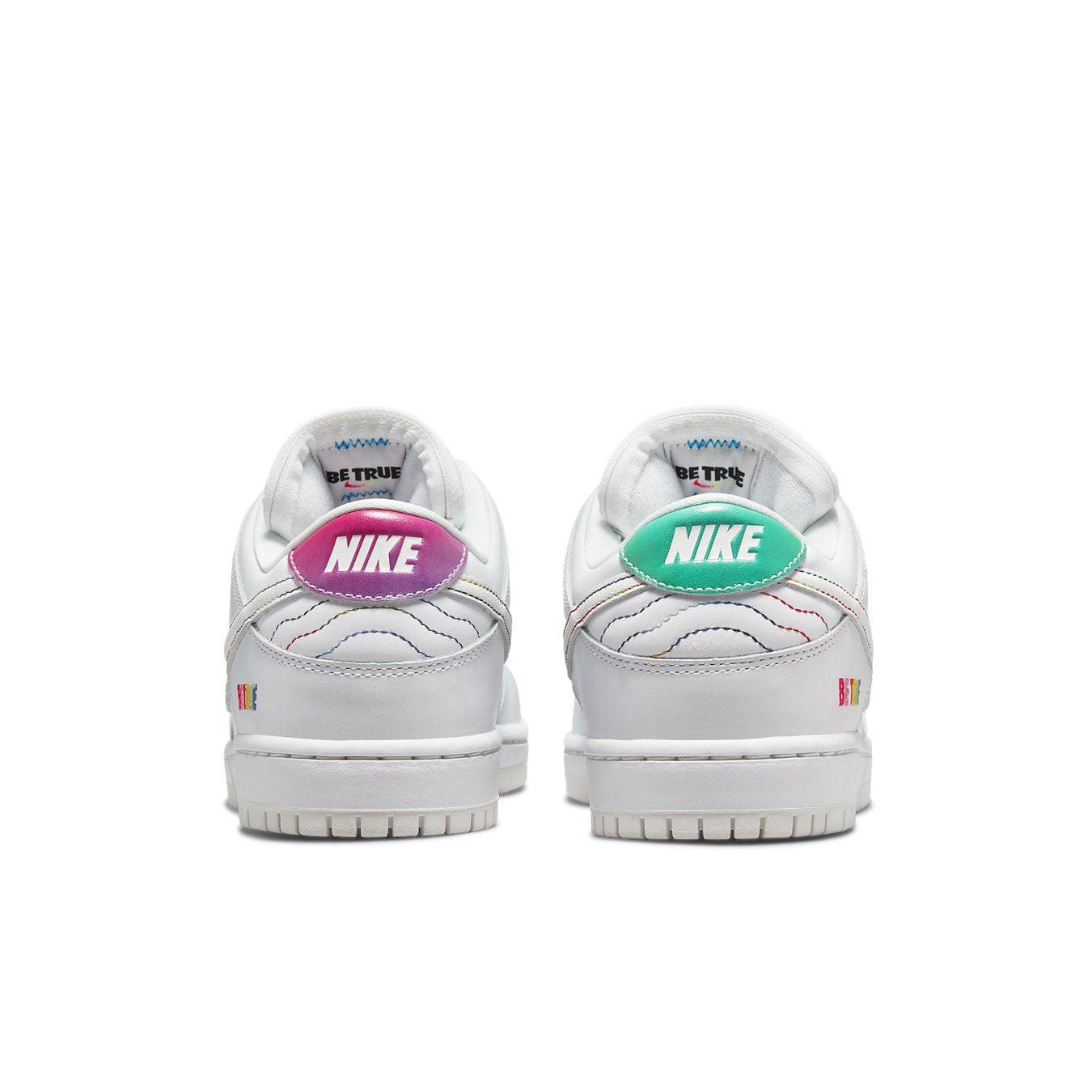 Nike SB Dunk Low Pro Be True sneakers featuring multicolored heel tabs and white leather design.