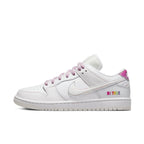 Nike SB Dunk Low Pro Be True in white leather with rainbow stitching and 'Be True' embroidery.