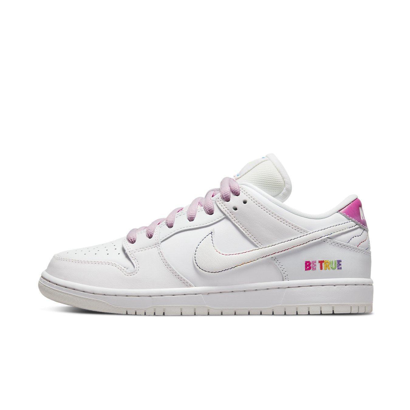 Nike SB Dunk Low Pro Be True in white leather with rainbow stitching and 'Be True' embroidery.