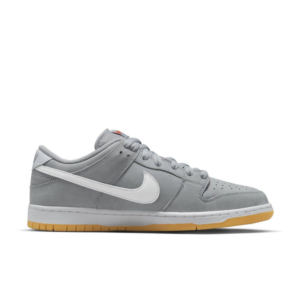 Nike SB Dunk Low Pro ISO 'Wolf Grey Gum' sneaker featuring grey leather upper and white Swoosh with gum sole.