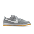 Nike SB Dunk Low Pro ISO 'Wolf Grey Gum' sneaker featuring grey leather upper and white Swoosh with gum sole.