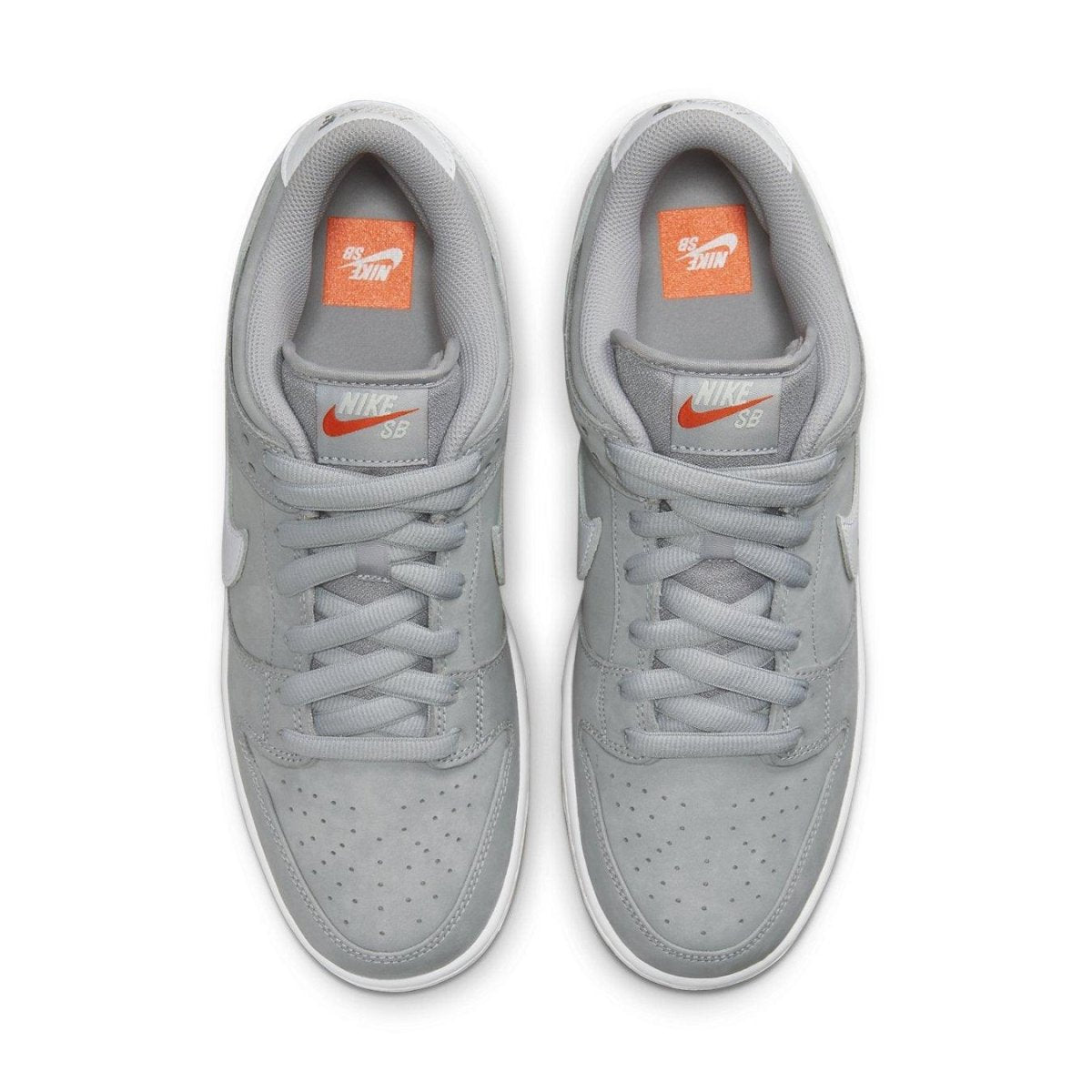 Nike SB Dunk Low Pro ISO Wolf Grey Gum sneaker in grey and orange, featuring a sleek design and classic Swoosh detailing.