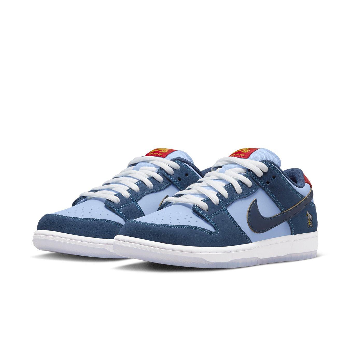 Nike SB Dunk Low Pro Why So Sad? sneakers in blue and white colorway with red accents and iconic swoosh logo.
