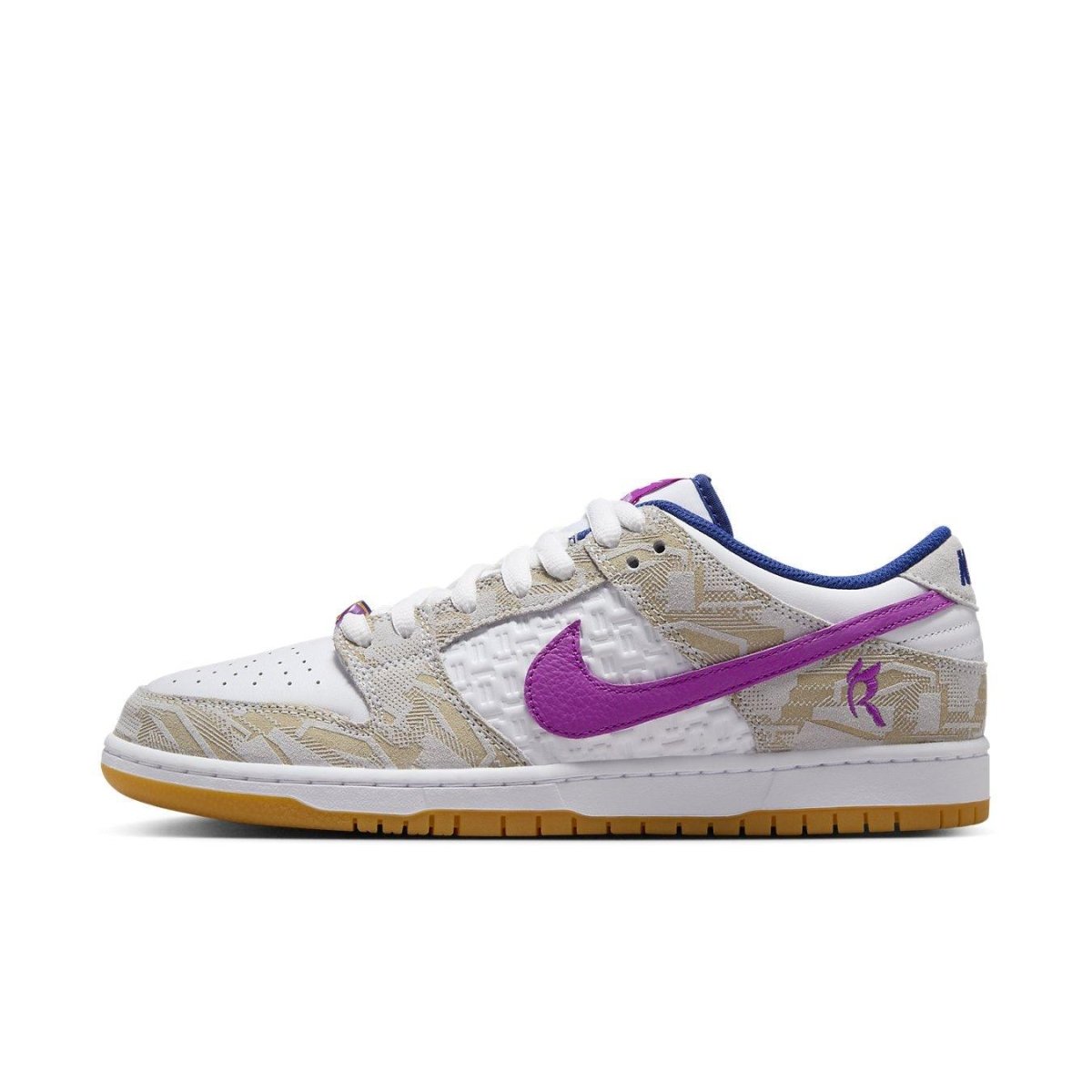 Nike SB Dunk Low Rayssa Leal featuring white leather, asymmetric purple Swoosh, and unique grey suede overlays.
