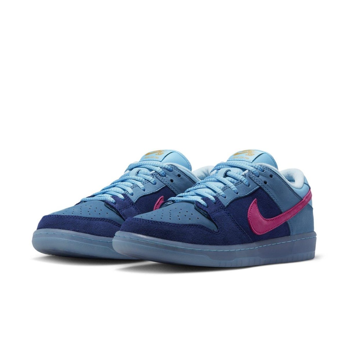 Nike SB Dunk Low Run The Jewels sneakers featuring blue suede upper and shocking pink Swoosh, perfect blend of style and comfort.