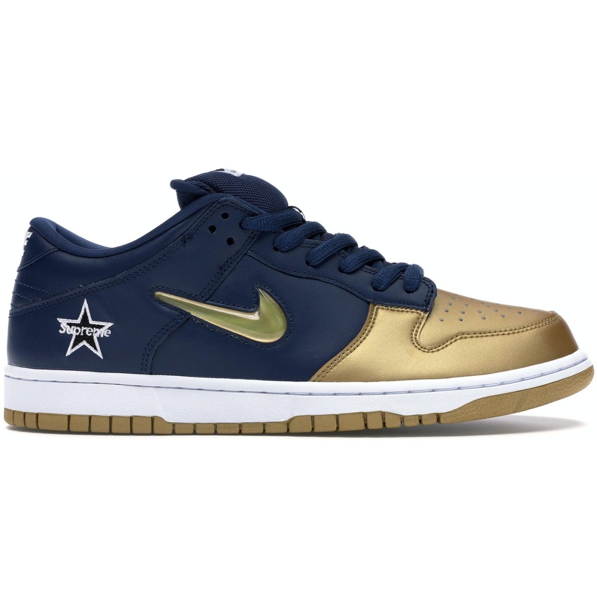 Nike SB Dunk Low Supreme with gold swoosh, blue upper, and white sole, blending skate and basketball aesthetics.