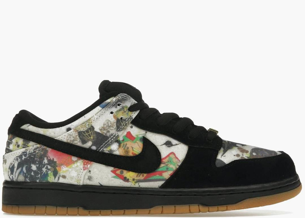 Nike SB Dunk Low Supreme Rammellzee featuring unique graffiti patterns and black suede accents.