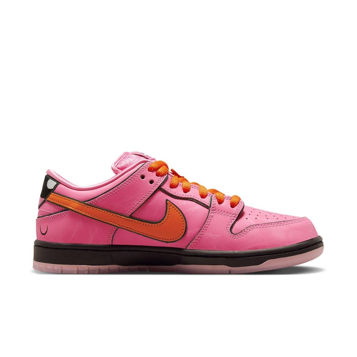 Nike SB Dunk Low 'Blossom' in pink nubuck with orange Swoosh and black details, inspired by Powerpuff Girls.