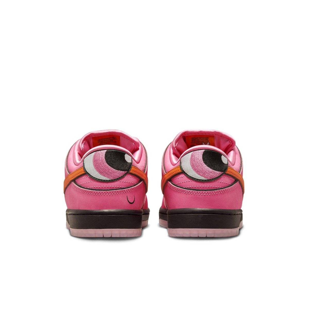 Rear view of Nike SB Dunk Low Powerpuff Girls Blossom sneakers with pink nubuck and cartoon eye details.