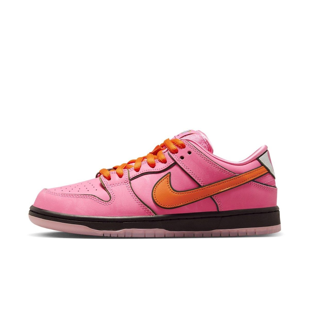 Nike SB Dunk Low 'Blossom' in pink nubuck with orange Swoosh and black accents.
