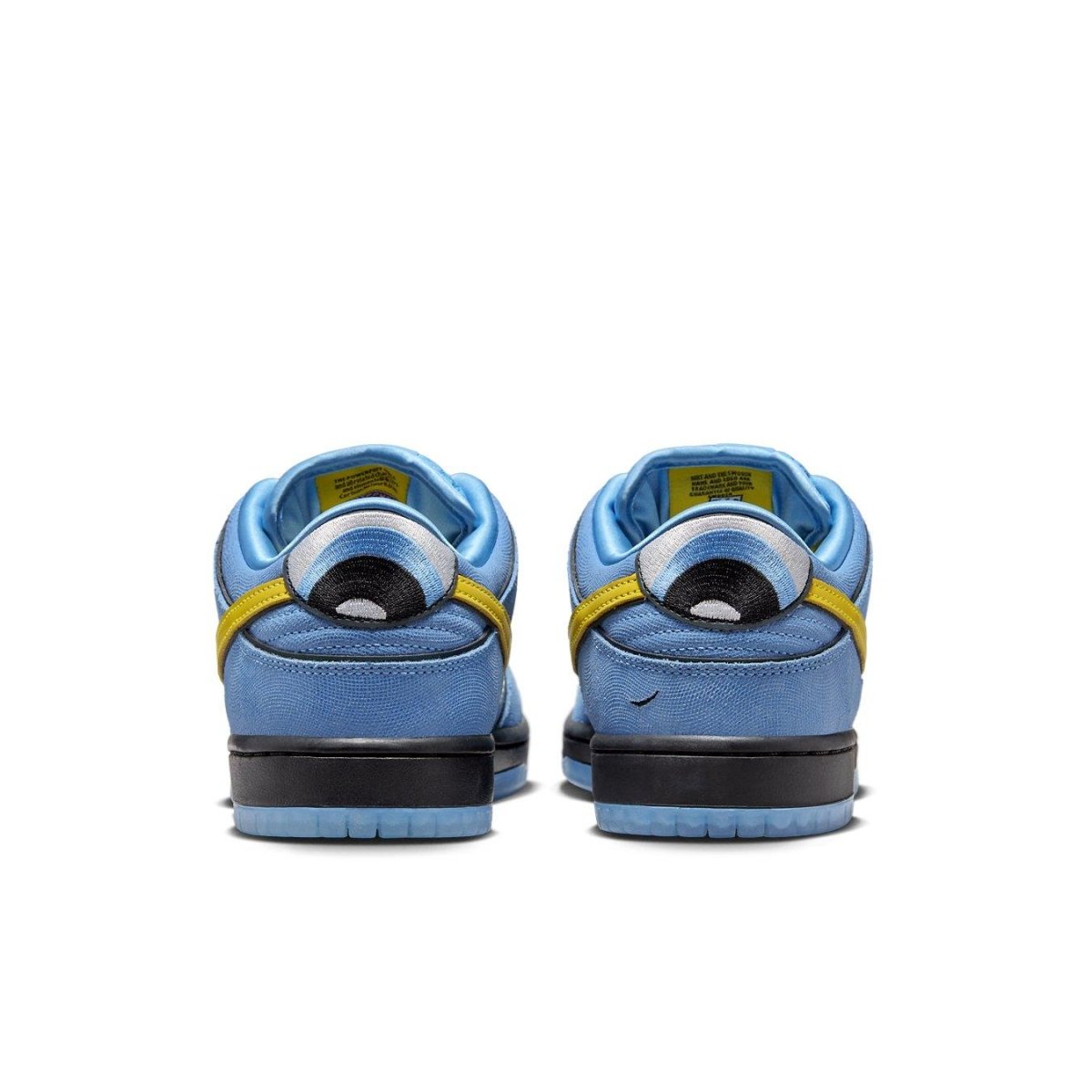 Nike SB Dunk Low Bubbles with blue leather upper and yellow Swoosh, featuring enlarged heel tabs.