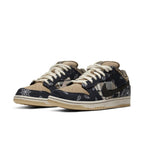 Nike SB Dunk Low Travis Scott with patchwork design and paisley prints in beige and navy.