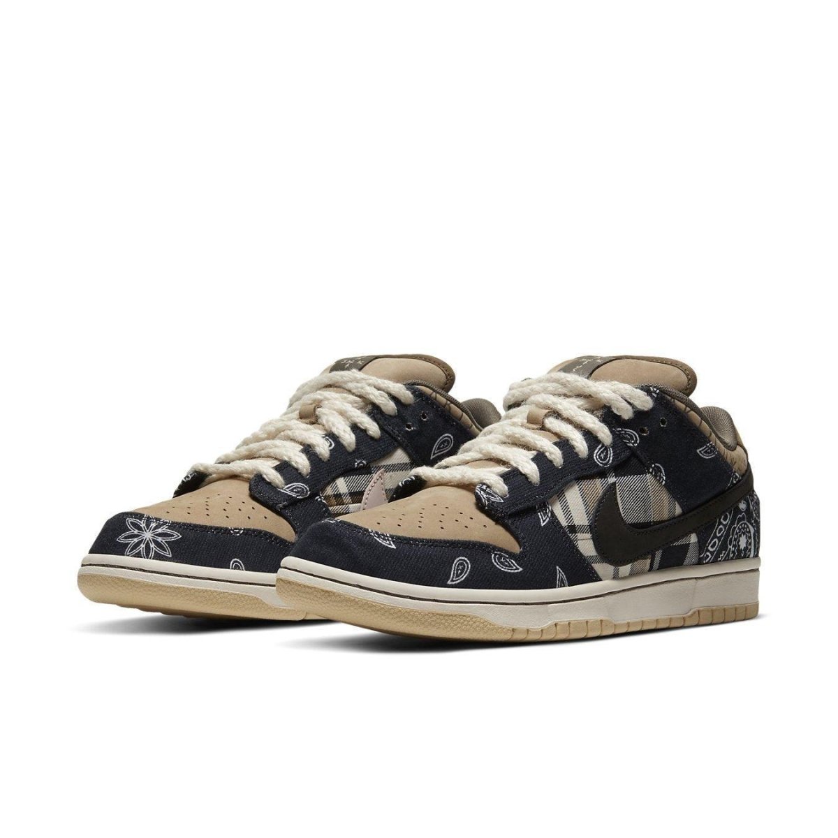 Nike SB Dunk Low Travis Scott with patchwork design and paisley prints in beige and navy.