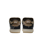 Nike SB Dunk Low Travis Scott sneakers featuring unique paisley and patchwork design in dark tones.
