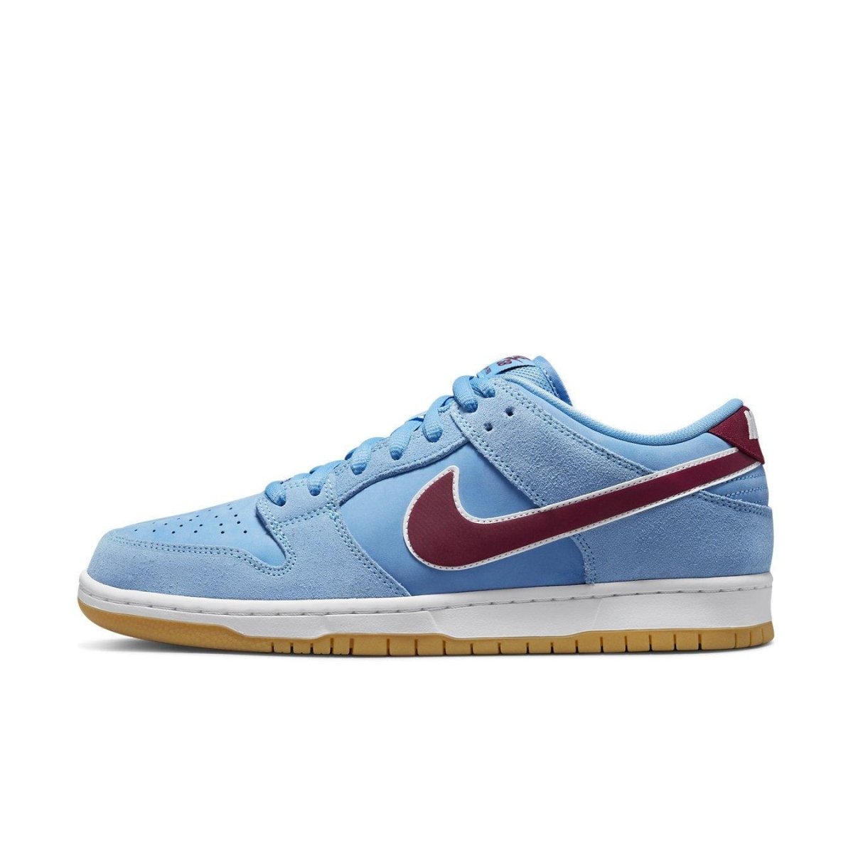 Nike SB Dunk Low Valor Blue Team Maroon sneakers featuring a blue suede upper and maroon Swoosh, designed for comfort.