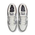Nike SB Dunk Low Yuto Horigome sneakers with white and gray suede details, top view angle.
