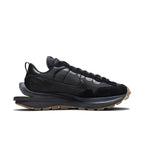 Nike Vaporwaffle sacai 'Black Gum' sneaker featuring a black nylon upper with suede and leather accents.