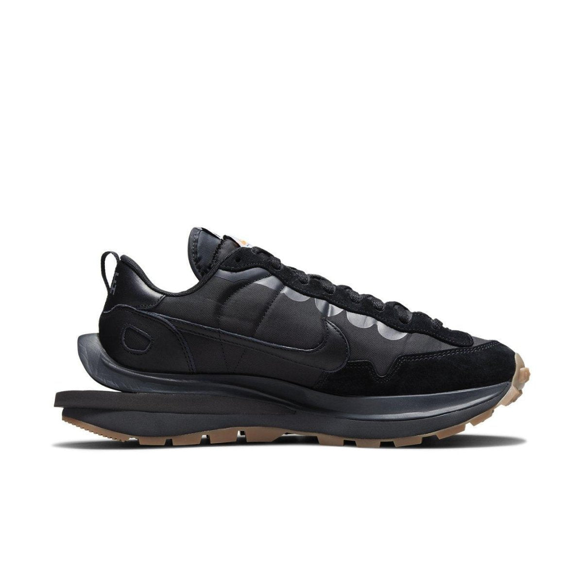 Nike Vaporwaffle sacai 'Black Gum' sneaker featuring a black nylon upper with suede and leather accents.