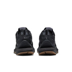 Back view of Nike Vaporwaffle sacai Black Gum sneakers featuring a black nylon upper and gum sole.